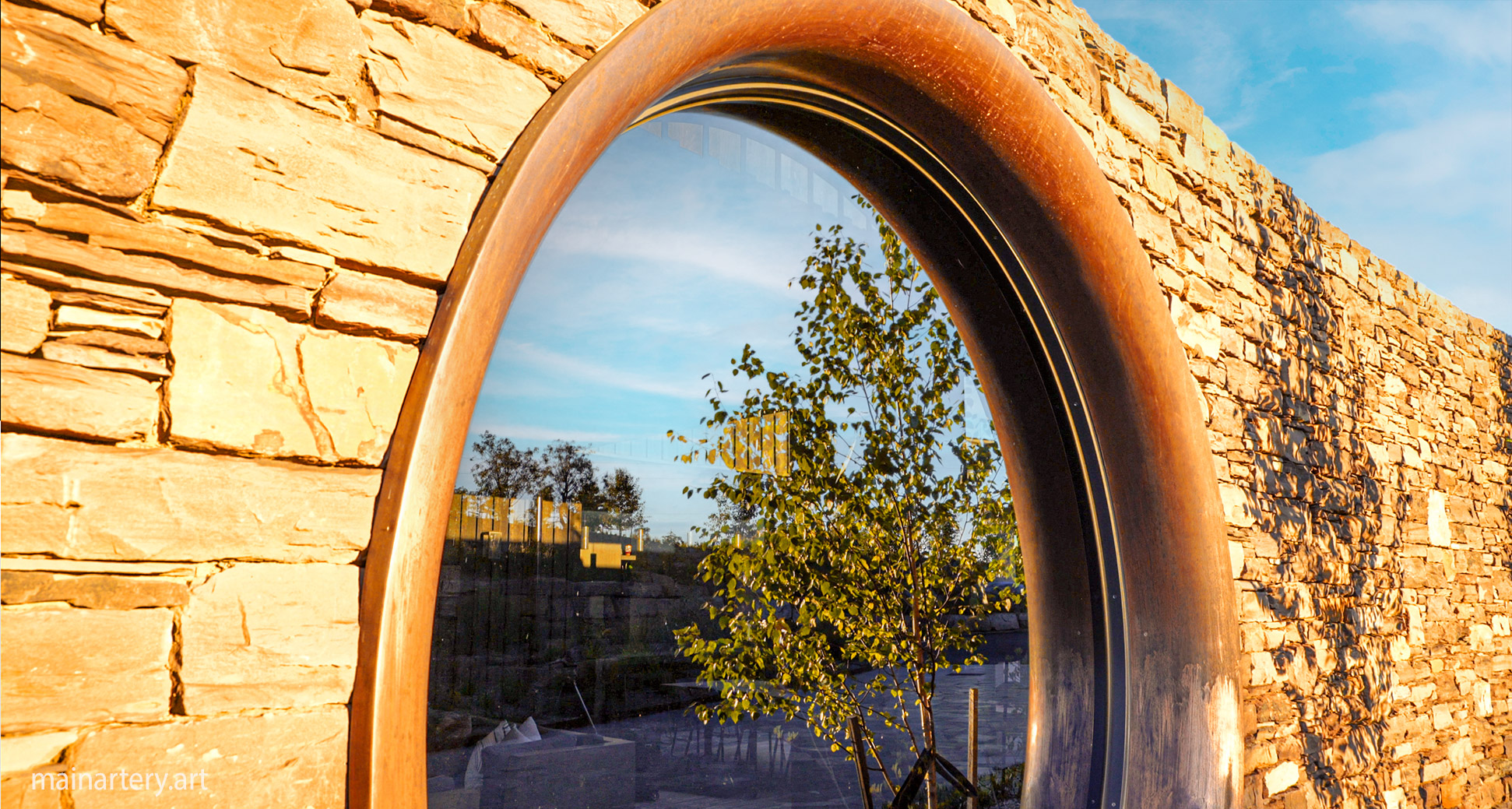 giant copper circular landscape architectural jewellery image