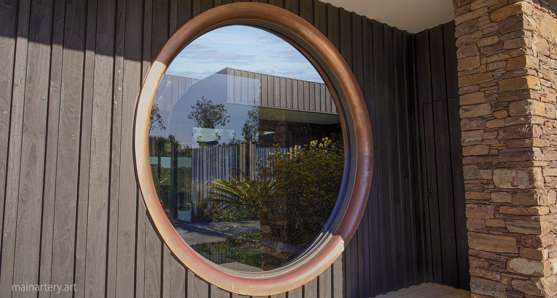 huge contemporary copper architectural window feature wooden wall image