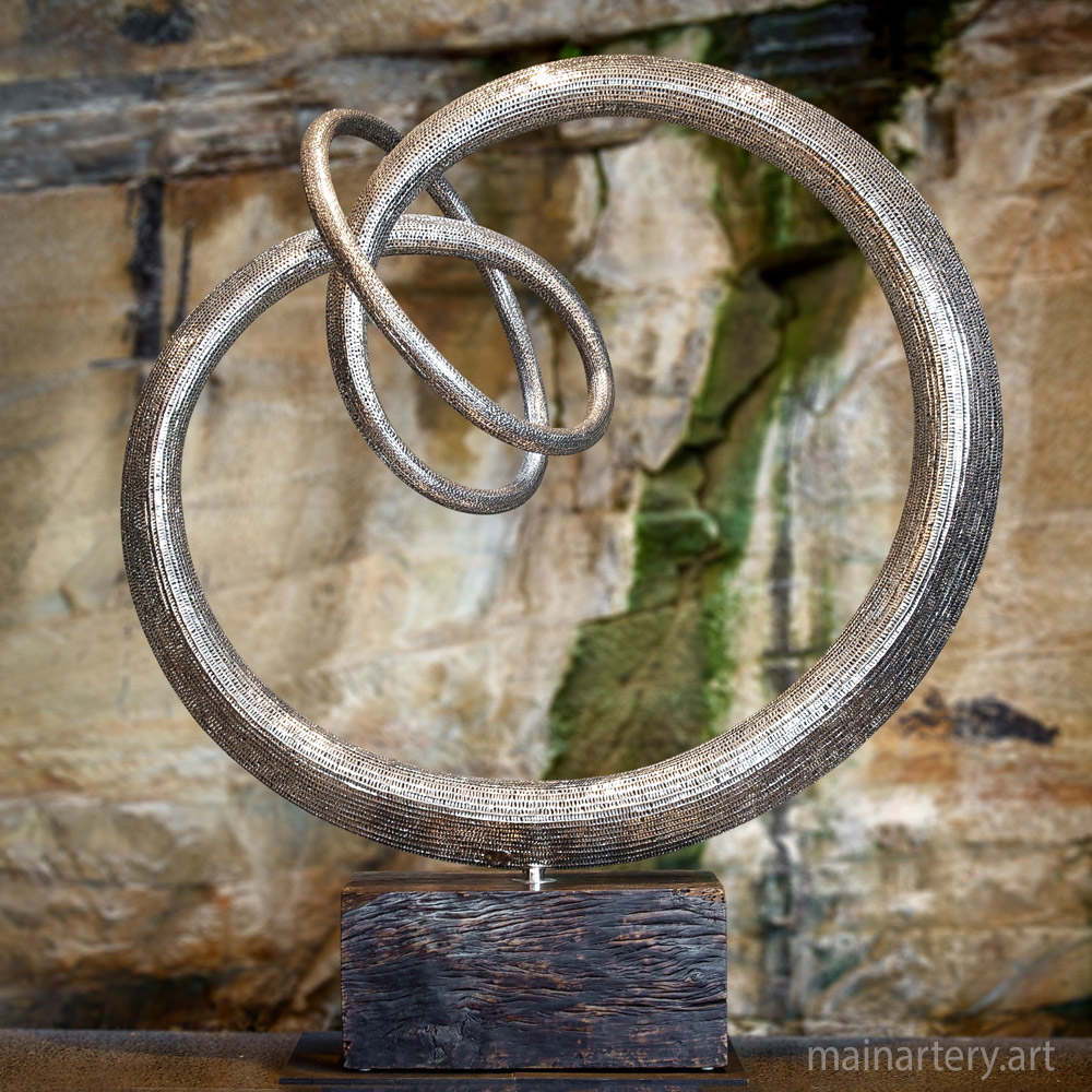 Cover: Entwine Stainless Steel Sculptures