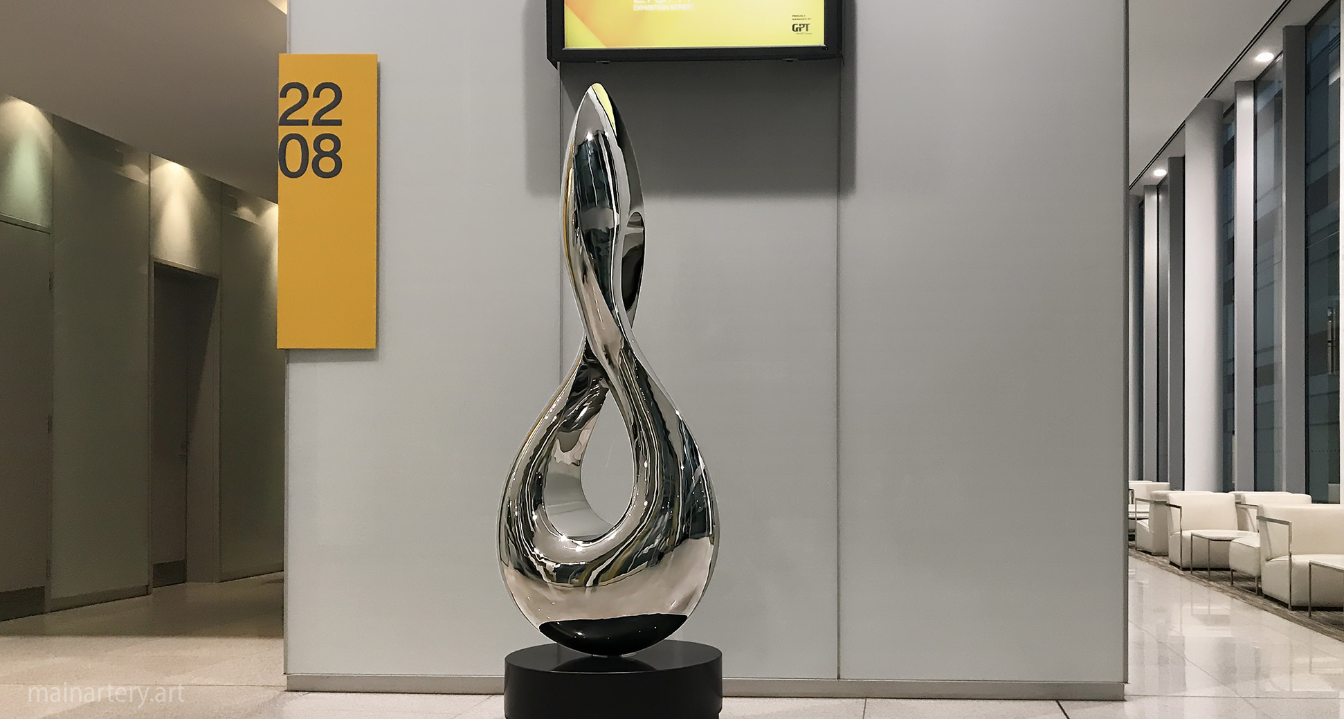 large infinity sculpture art corporate lease services image