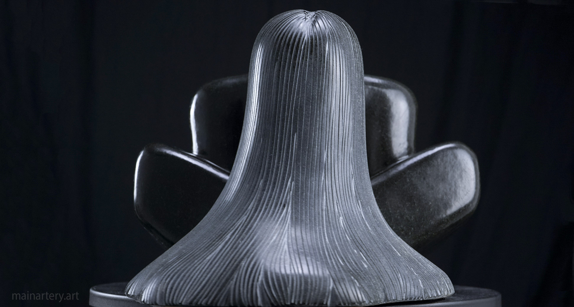 Modern sculpture 'The Bather' highlighting form and texture, 1942x1039 image