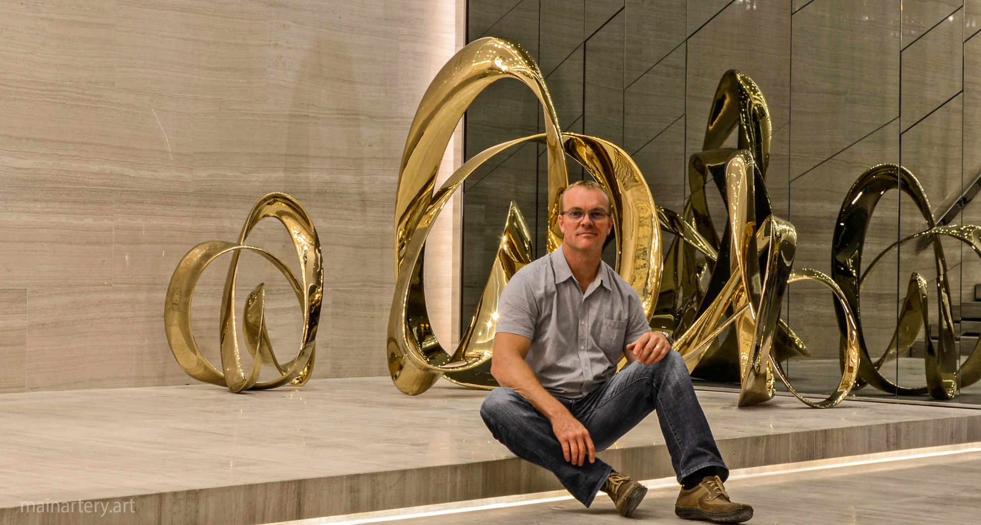 freestanding golden abstract hotel sculpture todd stuart image