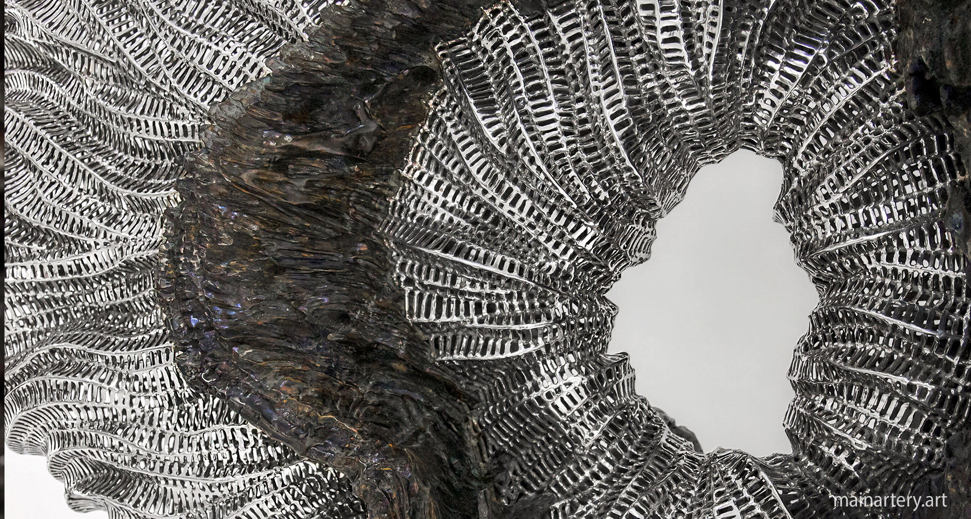 cyclops sculpture detail teak wood stainless image