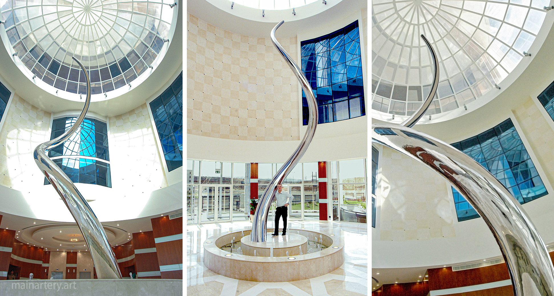 huge mirror polished abstract spiral interior sculpture image