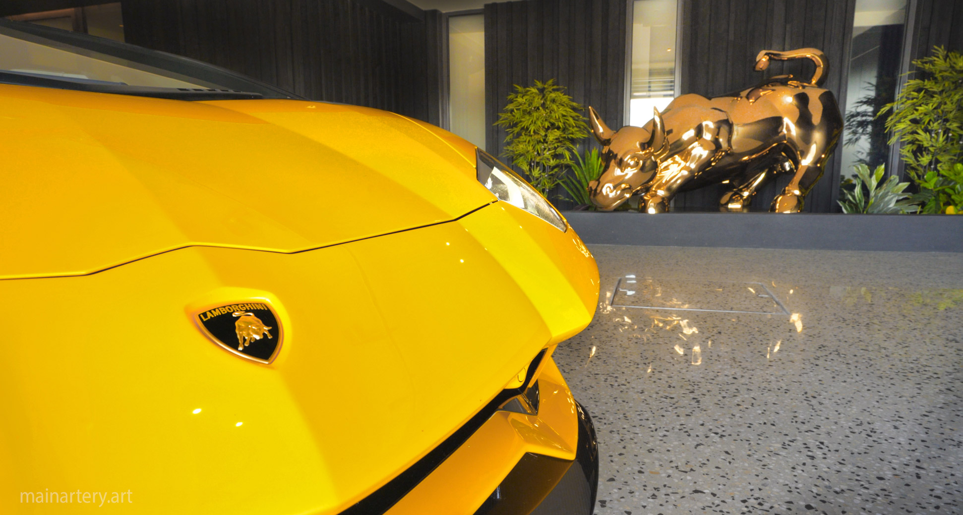 interior gold titanium bull lamborghini sculpture image