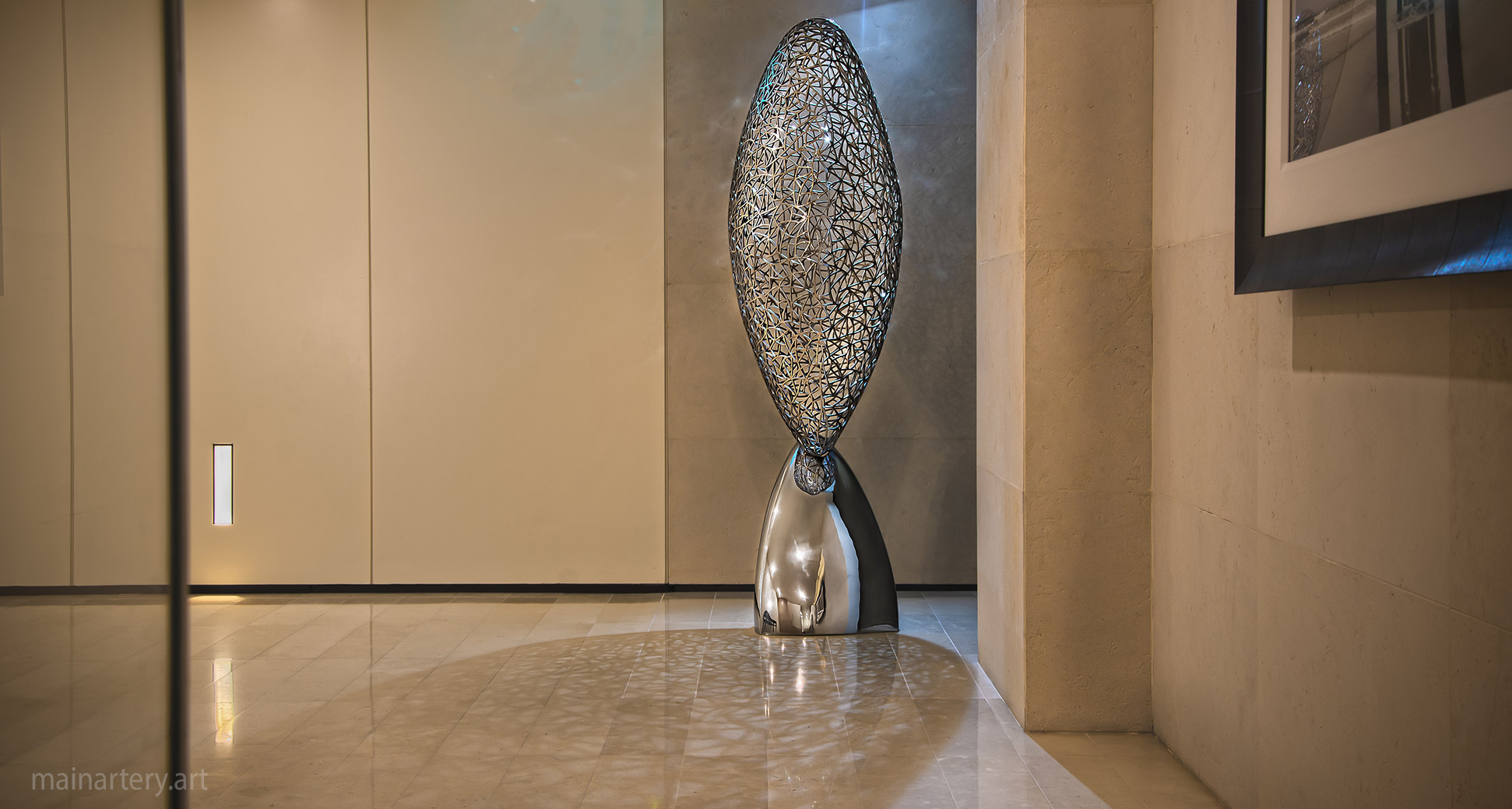 residential polished spherical interior pebble sculpture image