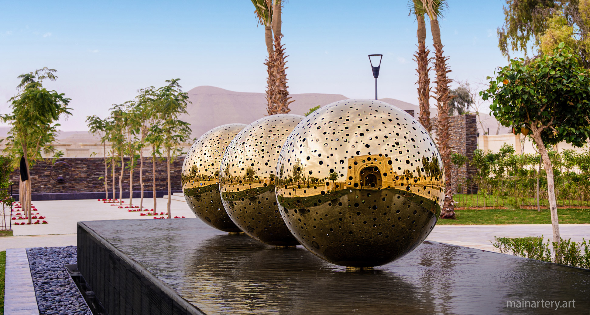 huge mirror polished spherical landmark art image
