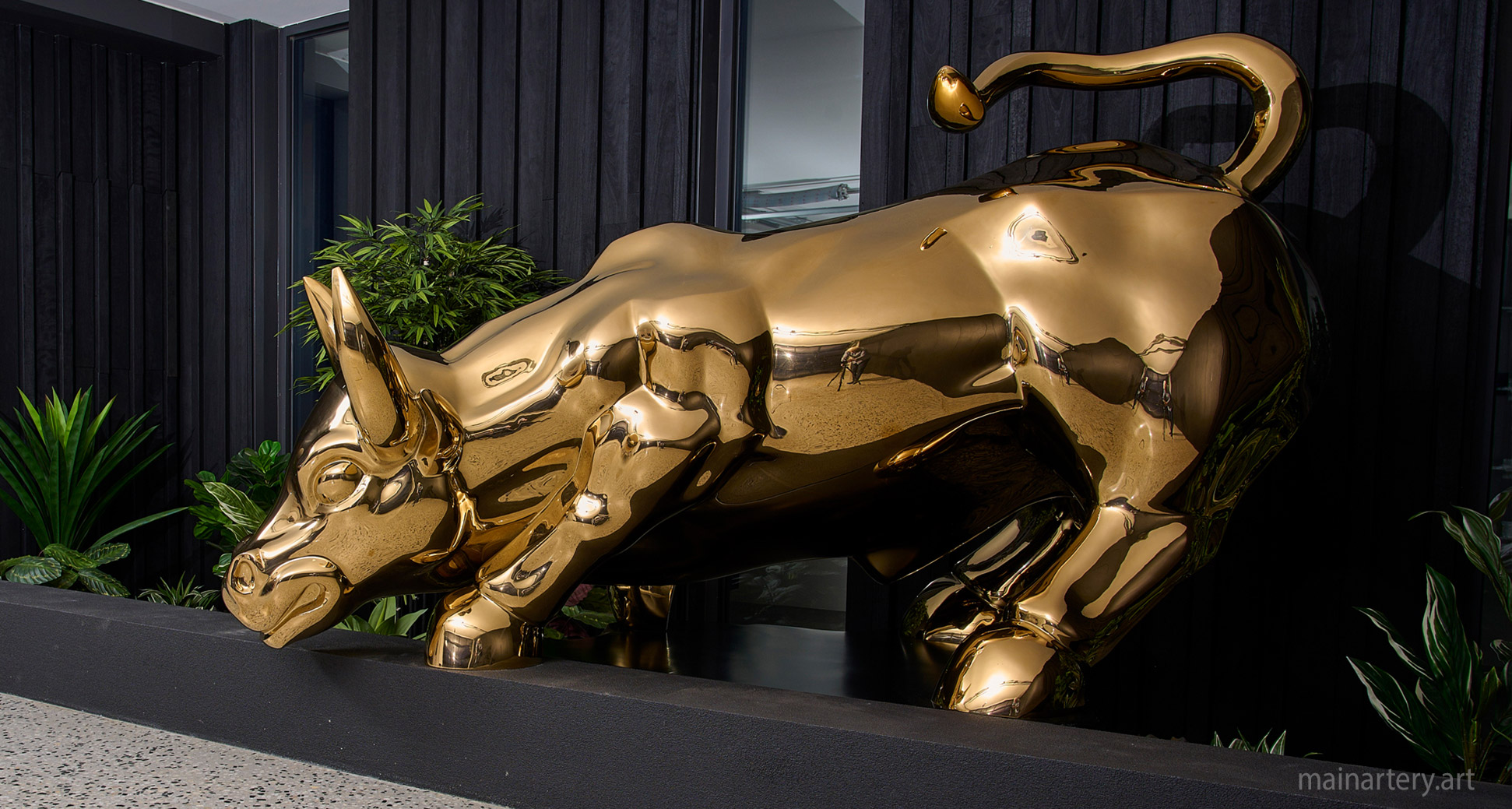 large mirror polished contemporary bull public art image