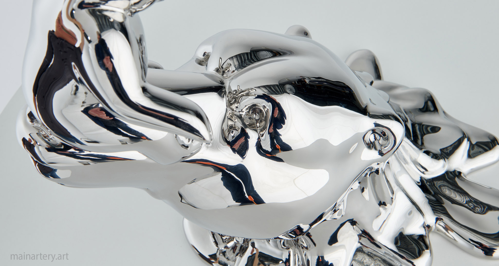 mum polar bear looking at baby cub sculpture image