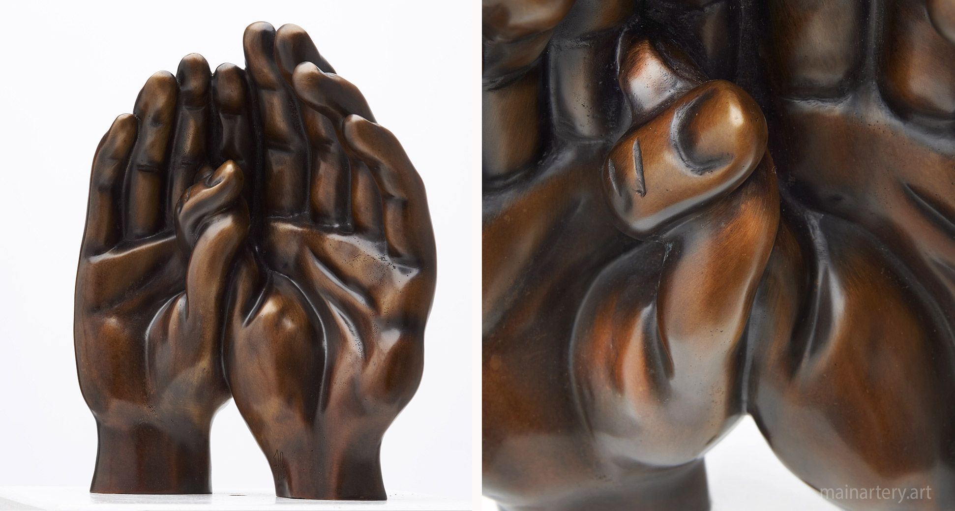 small bronze representational hand interior sculpture image